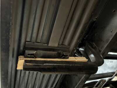 The Running Board mounted bracket now sits forward of Frame Mounted bracket